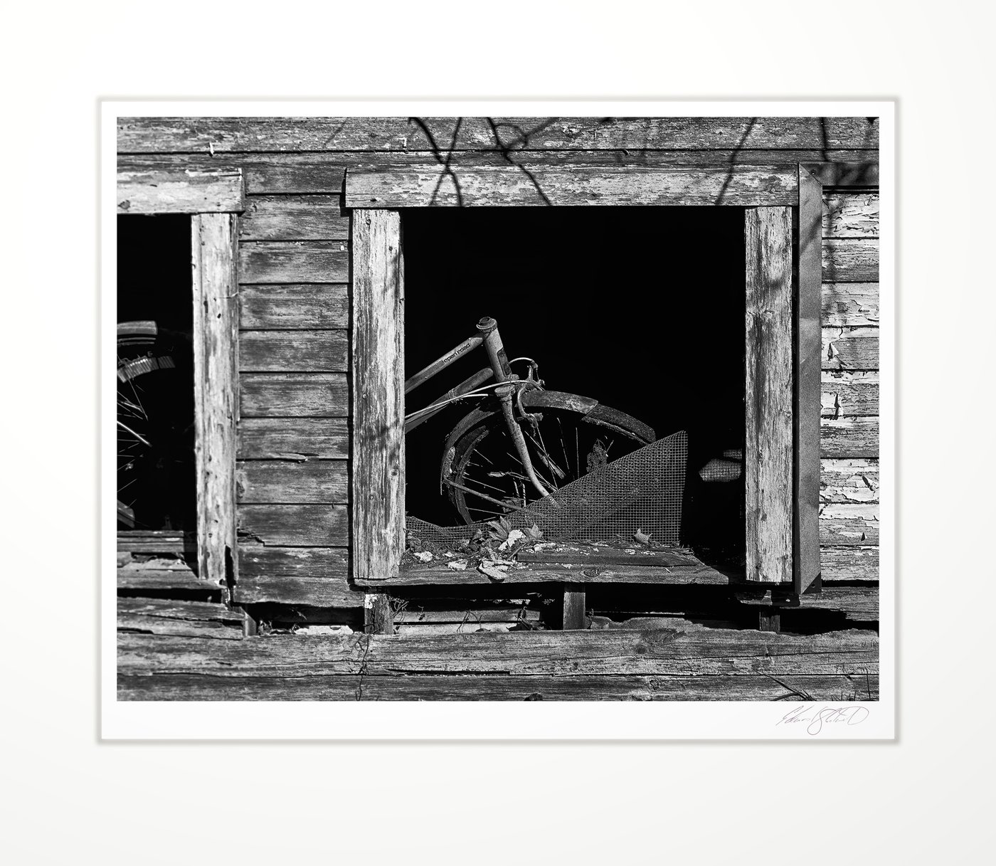 An old bicycle seen through a barn window. Concord, Michigan -2024