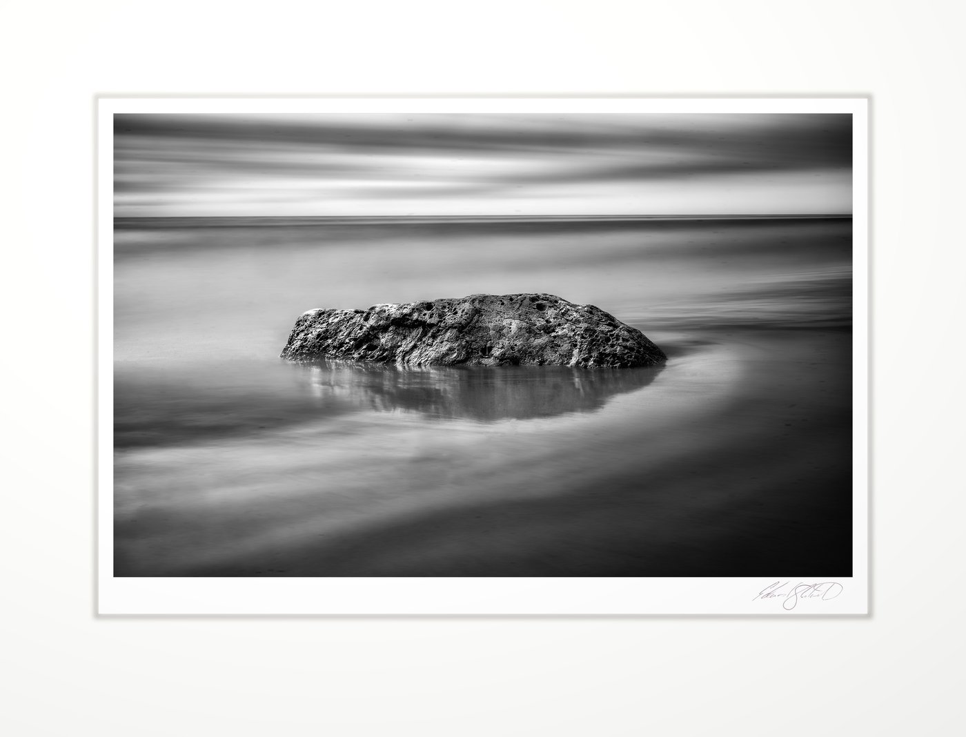 A lone boulder in Lake Michigan at Naubinway, Michigan -2020
