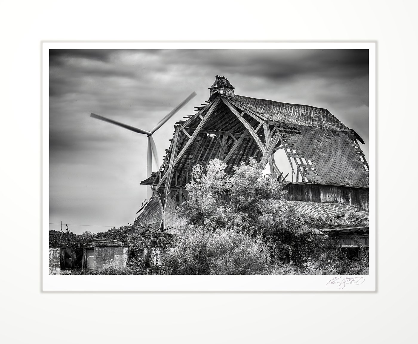 Collapsing barn with wind turbine