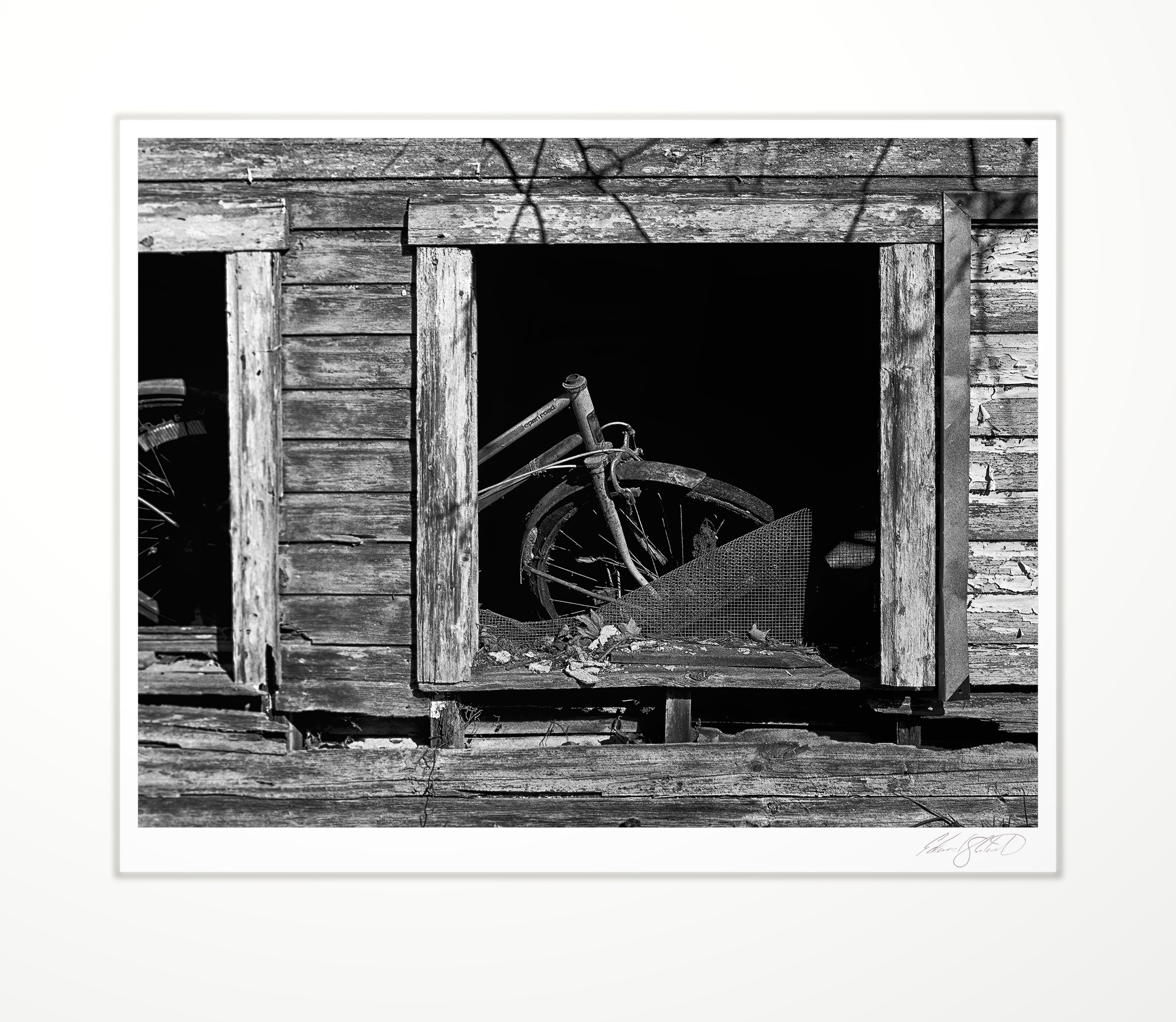 An old bicycle seen through a barn window. Concord, Michigan -2024