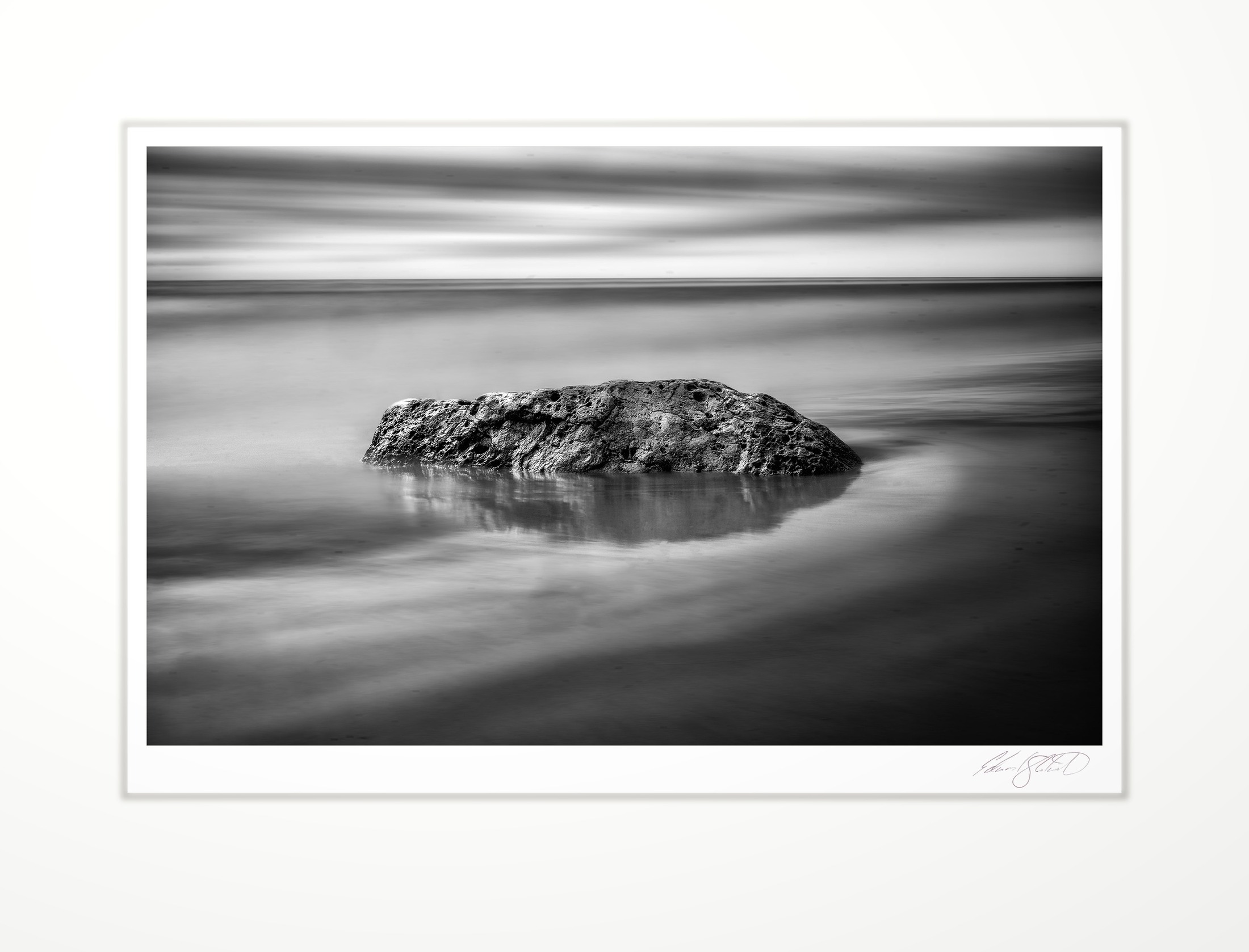 A lone boulder in Lake Michigan at Naubinway, Michigan -2020
